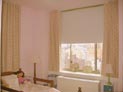 Room darkening roller shades and ripple fold drapes for children�s bedroom in upper east side, Manhattan