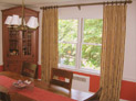 Drapes on decorative hardware for living room windows in Westchester, New York