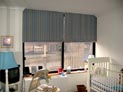 Flat roman shades for baby�s room windows in Midtown, Manhattan