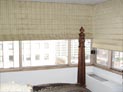 Flat roman shades with ribs for large bedroom windows in Upper West Side, Manhattan