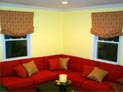 Relaxed roman shades for living room windows in Long Island, New York