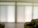 Vertical pleats honeycomb shades for large sliding doors in living room