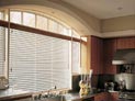 Wood blinds installed in kitchen windows