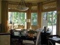 Bamboo shades and drapes for large windows in living room