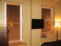 Wood blinds for bedroom balcony door and windows in Lower Manhattan, NY