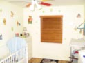 Wood blinds for baby�s room window in Brooklyn, NY