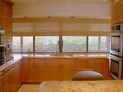 Woven wood shades for kitchen windows