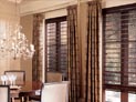 Woven wood shades, and side panels for dining room doors